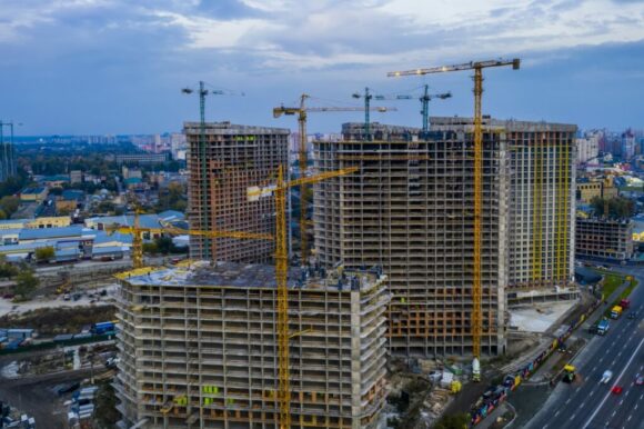 Optimized-construction-site-with-cranes-at-sunset-constructi-FT78E28_1 Optimized-construction-site-with-cranes-at-sunset-constructi-FT78E28_1